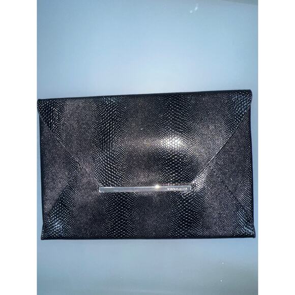 BCBGMaxAzria Clutch Bundle (3) Black Bronze & Black/White Envelope Bags Sale!
As - Picture 4 of 11